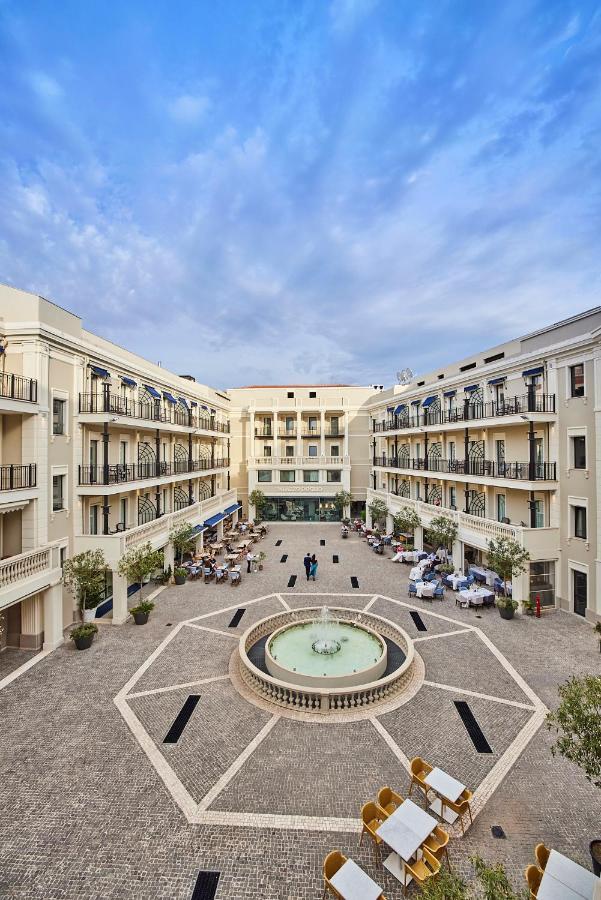 Hotel Palazzo Doglio Cagliari Exterior foto The courtyard of the hotel
